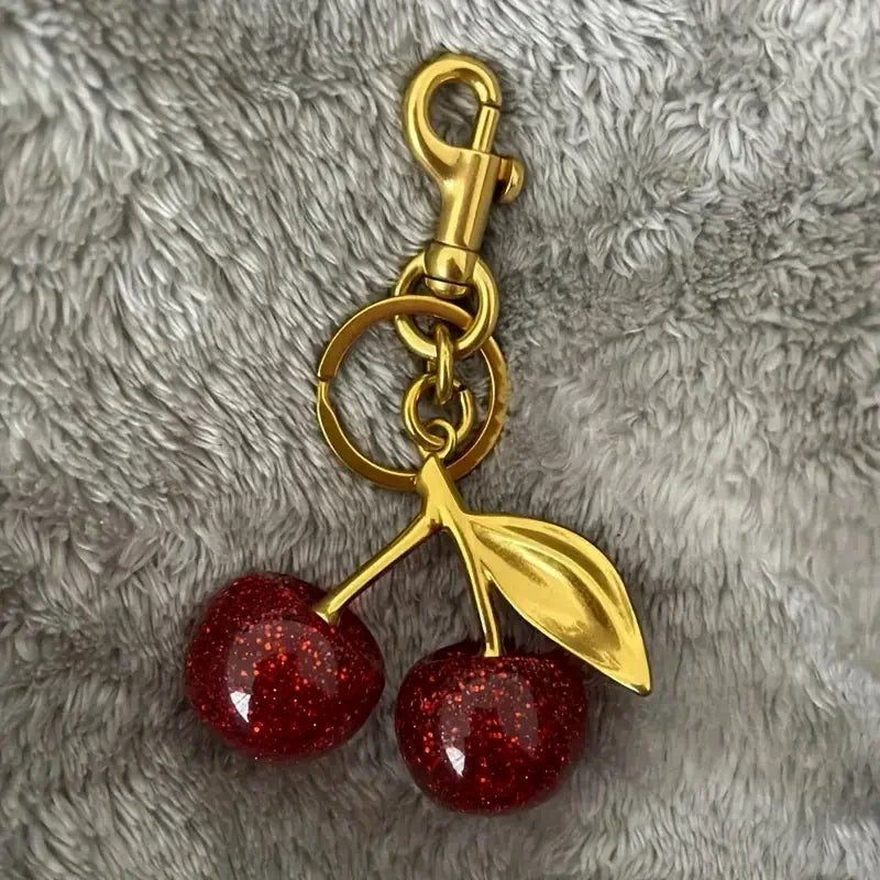Golden Cherry Keychain Charm - Shiny Resin & Metal Bag Accessory, Elegant Gift for Women, Purse or Handbag Decoration